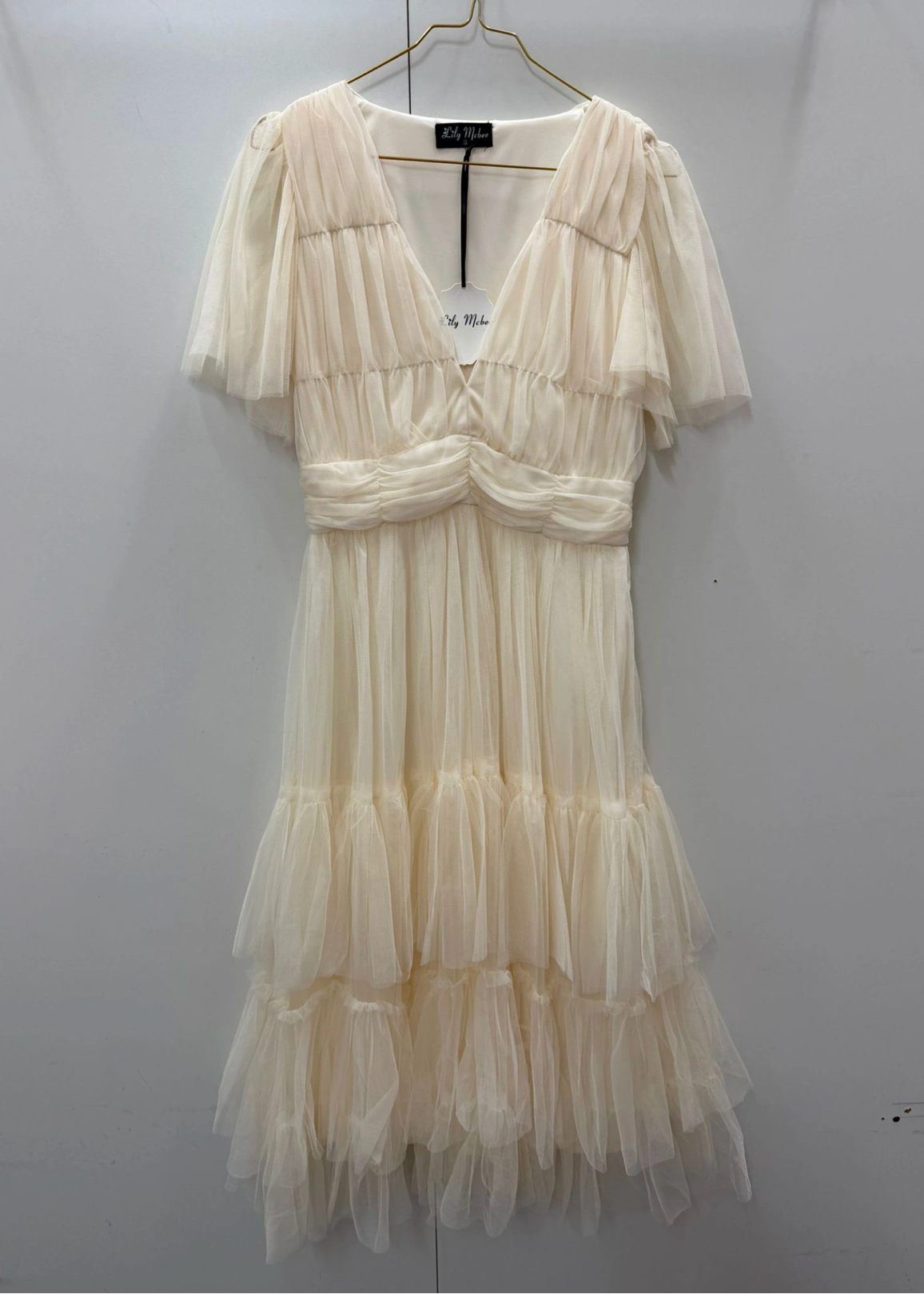 Robe crème et mousseline à étages